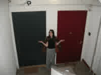 nina next to really tall doors