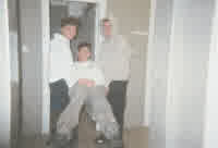 andrej and me holding strale in a basketball hoop